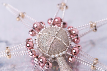 silver-gold Christmas ornament with corals