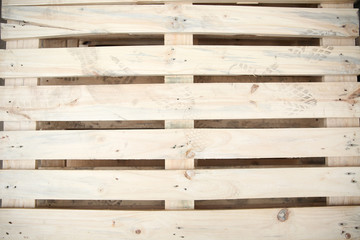 background of pallet with boot prints