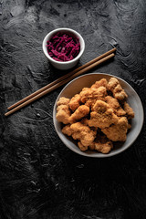 Delicious crispy fried chicken breast strips.