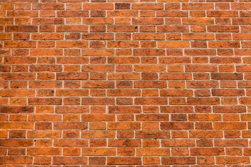 Texture, background. Old red brick wall, in the rain, destroyed by time