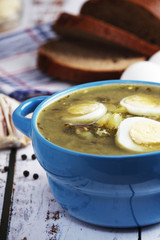 A bowl with homemade sorrel soup	