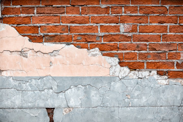 Old broken wall with visible bricks texture