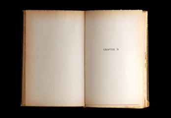 old book with blank pages on black background