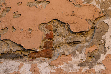 Old brick wall with red and brown coloring