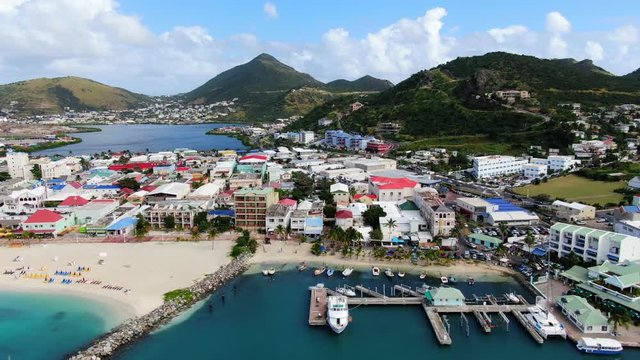 Aerial view of the Philipsburg harbor on Saint Martin island. Some hotels, beach and sailing yachts. Beautiful beach and sailing yachts piers.