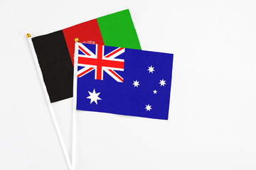 Australia and Afghanistan stick flags on white background. High quality fabric, miniature national...