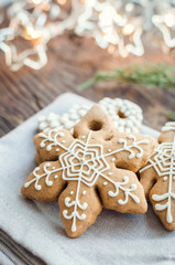 Christmas homemade gingerbread cookies on wooden table