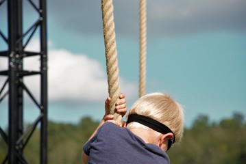 Obraz premium father and son on swing in park