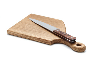 Kitchen Knife Lying On A Cutting Board, White Background