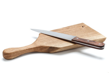 Kitchen Knife Lying On A Cutting Board, White Background