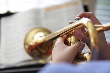 Obraz na płótnie Canvas Youth playing trumpet