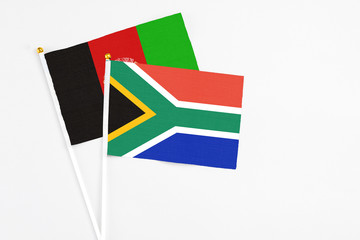 South Africa and Afghanistan stick flags on white background. High quality fabric, miniature...