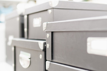 Fototapeta na wymiar Storage box with lids and metal corners. Closeup view, storage concept