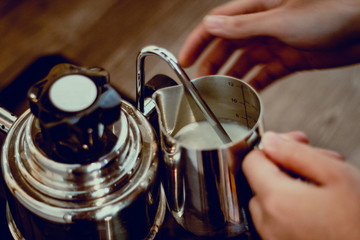 Hot milk preparing for coffee