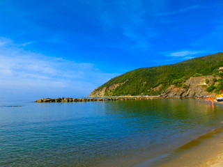The coastline of Moneglia with the village on the sandy beach