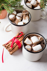 Hot chocolate, cocoa  on the festive white wooden table