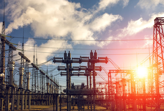  High-voltage  Power Lines At Storm Clouds.