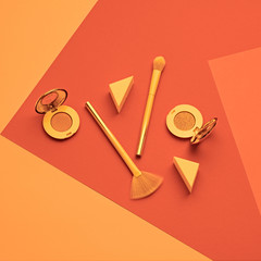 Cosmetic makeup accessories layout. Fashion creative minimal neon Set. Trendy lipstick brushes. Art Design Concept, colorful Style.Beauty cosmetic make up tools, fashionable geometry orange flat lay