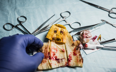 Banana stabbed with a knife