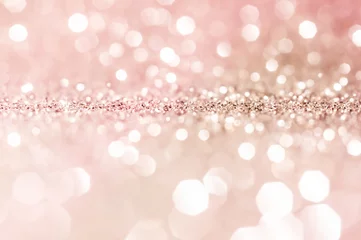 Rosa Gold, rosa Bokeh, kreisförmiger abstrakter heller Hintergrund, rosa Gold leuchtende Lichter, funkelnder glitzernder Valentinstag, Frauentag oder romantische Kulisse für Veranstaltungslichter. Verschwommener abstrakter Feiertagshintergrund. © nongnuch_l