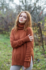 young woman in autumn park