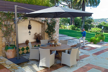 dining table with chairs in the garden 