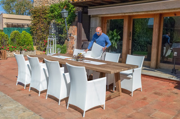 dining table with chairs in the garden 