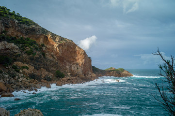 storm in the mediterranean sea at sunset