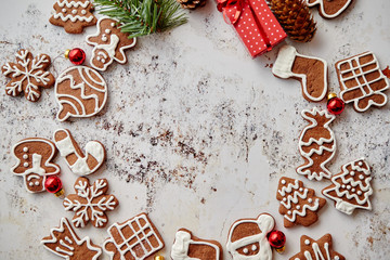 Different shapes of Christmas gingerbread cookies assorted in circle