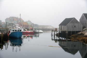Fototapeta na wymiar cove of fishing boats Peggys cove Nova Scotia Canada