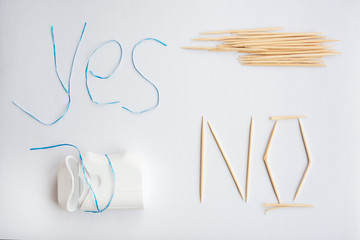 dental floss instead of toothpicks, the harm from the use of toothpicks oral care concept, caries...