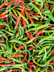 Red and green chili peppers background