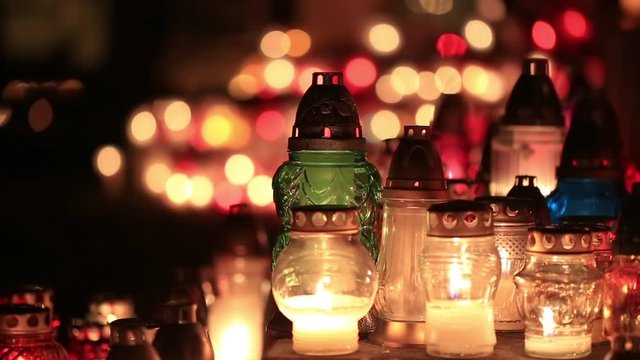 Candles on a memorial Poland. Kracow. shot on a full-frame camera Canon 6D with 100mm f2.8 lens.