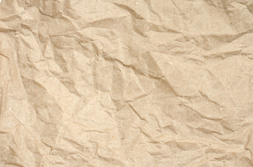 Close up of brown crumpled paper craft. Top view