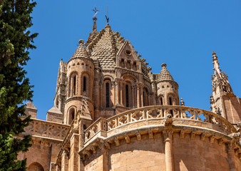 Fototapeta na wymiar Ornate carvings and bell tower of the Old Cathedral in Salamanca
