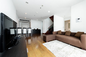 Modern living room and kitchen in small apartment 