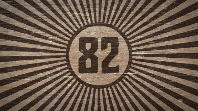 Number eighty-two On Wooden Texture. Ideal For Your Numbers / Countdown / Aniversary Projects. High Quality Seamless Animation. 4K, 60fps 