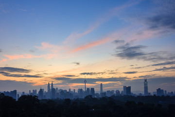 beautiful sunrise over kuala lumpur city skyline
