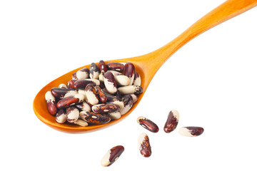 kidney beans in wooden spoon isolated on white background