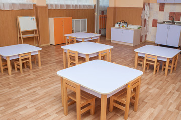 Tables and chairs for kindergarten. Furniture, desks for preschoolers.