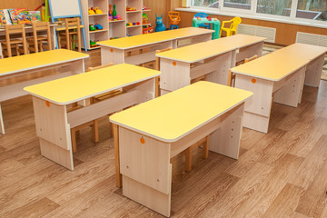 Tables and chairs for kindergarten. Furniture, desks for preschoolers.