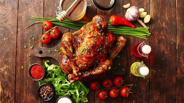 Roasted whole chicken or turkey served with chilli pepers and chive