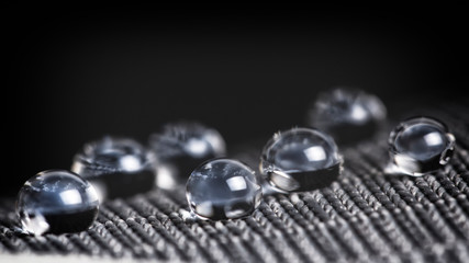 water resistant membrane fabric with water droplets
