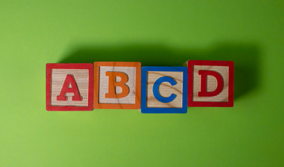 A, B, C and D wooden blocks