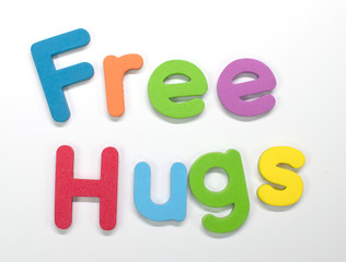 "Free Hugs" written with color sponge