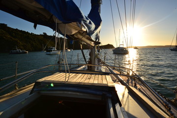 A yacht boat with the sunset light