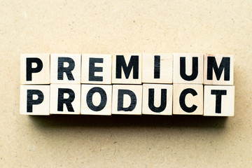 Letter block in word premium product on wood background