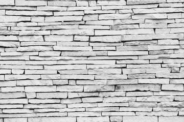 Pattern on the white stone wall  texture background