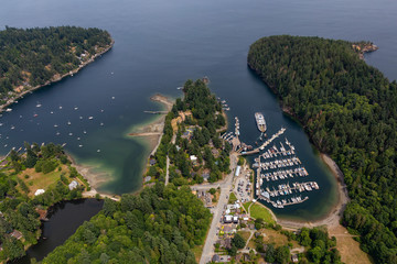 Snug Cove, Bowen Island, British Columbia, Canada. Aerial view of a marina and Ferry Terminal on...