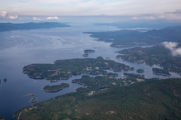 Sunshine Coast, British Columbia, Canada. Aerial View of Beaver Island and Madeira Park during a sunny and hazy summer morning.